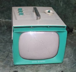 lot 120 image: Mid Century Modern General Electric Portable Televison