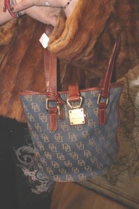 lot 27 image: Vintage Dooney & Bourke Denim Bucket Bag