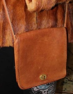 lot 168 image: Vintage Coach British Tan Flap Crossbody Purse