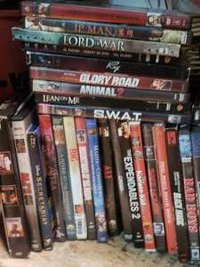 lot 80 image: Plethora of ActionDramaSuspense DVDs & DVD Player