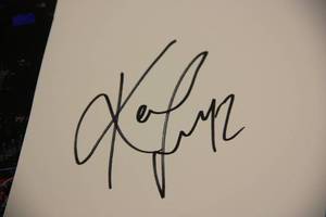 lot 48 image: Kevin Love Minnesota Timberwolves Cut Autograph with 8x10 Photo