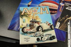 lot 112 image: Lot of Flats Programs Comic Book and Autographed Photo