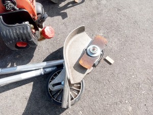 lot 052 image: Working 25.4cc Gas 2-Stroke Cycle PAS Power Head With 4 Attachments (ProPaddle, Cultivator, Brush Blade, Shaft Edger) ($1,000 value)