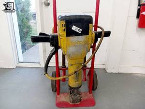 lot 150 image: Bosch Brute Jack Hammer with Cart and Chisels