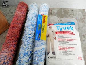 lot 174 image: 10 Rolls of General Purpose Masking Paper and 3 Roll of Plastic and 3 Purdy Colossus Paint Rollers , and Tryvek Suit