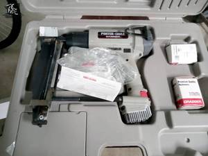 lot 145 image: Porter Cable Bammer CMS200 Cordless Gas Crown Stapler with 2 Cartridges and Case