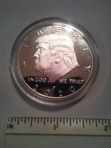 lot 41 image: Donald Trump 2020 silver colored Coin.