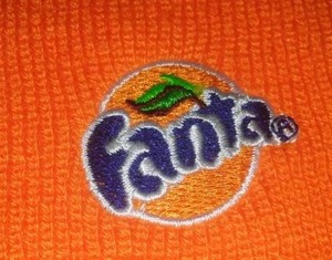 lot 170 image: Halloween Hat and beads, Fanta soda.