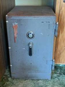 lot 10 image: Antique Protectall Safe on Casters 19 wide 24 deep 31 tall