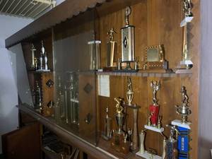 lot 14 image: Trophy Case Full of Vintage 50s 60s 70s Trophies