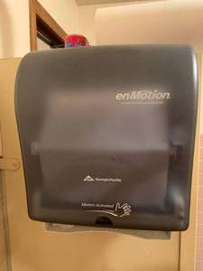 lot 64 image: Enmotion Paper Towel Dispenser $118 retail
