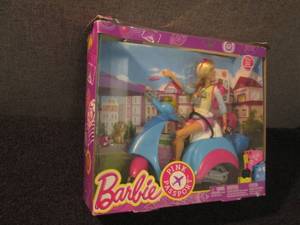 lot 319 image: Barbie Pink Passport...