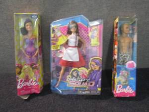 lot 329 image: 2 Barbies, Ken Doll...