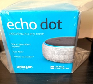 Three Amazon Echo Dots And One Tower