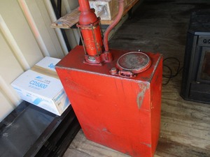 lot 7 image: VINTAGE OIL CONTAINER WITH HAND PUMP