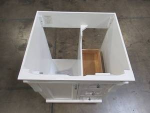lot 104 image: Foremost Naples 24 in. W x 21-78 in. D x 34 in. H Vanity Cabinet Only in White NAWA2421D