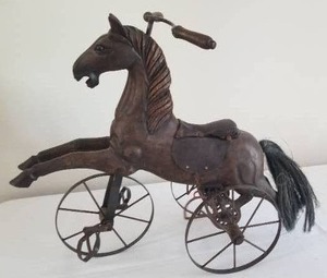 lot 93 image: Carved Toy Horse Tricycle