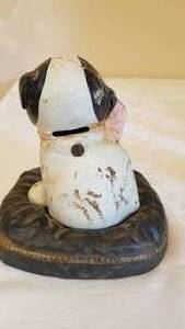 lot 54 image: Antique Puppy On Pillow with Bee Cast Iron Hubley Still Bank