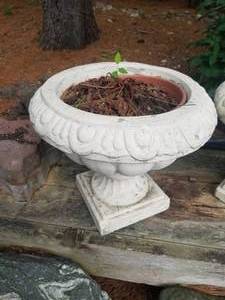 lot 197 image: Pair of Classic Concrete Planters