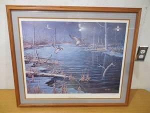 lot 22 image: Ken Zylla Early Arrivals Wood Ducks Landing in a Snowy Pond Framed Artist Proof 58
