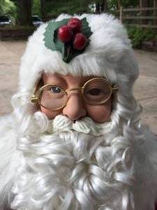 lot 54 image: 50 Inch Electric Dancing Santa