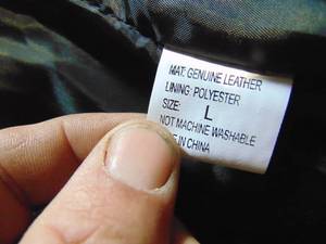 lot 27 image: Large Leather Coat