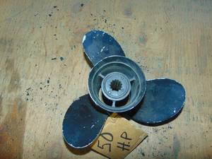 lot 165 image: Boat Prop and Fishing Reel
