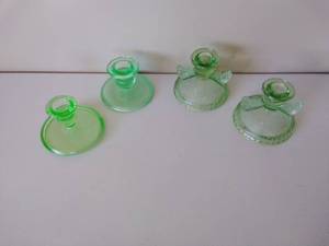 lot 123 image: Four Vintage Uranium Glass Candle Holders