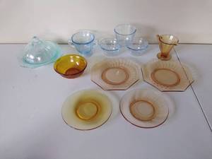 lot 138 image: Eleven Pieces of Multi-Colored Depression Glass