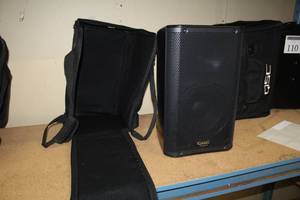 lot 107 image: QSC 1KW 105-degree Active Loudspeaker K8 with Carry Case