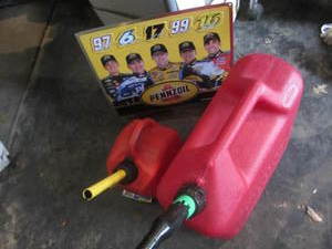 lot 45 image: Gas Cans, Pennzoil Sign