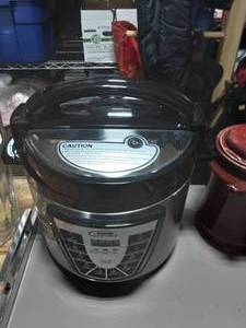 lot 1 image: Power Pressure Cooker XL (Like New-Used Once)