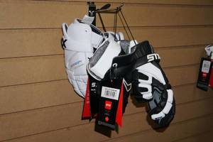 lot 77 image: 2 Sets STX Gloves