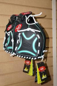 lot 210 image: 2 Rawlings Softball Gloves