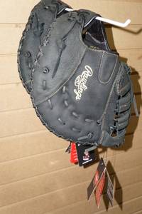 lot 211 image: 2 Rawlings Catcher Mitts