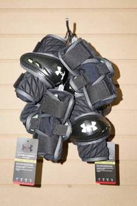 lot 151 image: 4 Sets Under Armour NexGen Youth Arm Pads