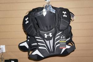 lot 161 image: 3 Under Armour Strategy Youth Medium Shoulder Pads