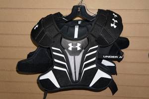 lot 162 image: 2 Under Armour Strategy Youth Large Shoulder Pads