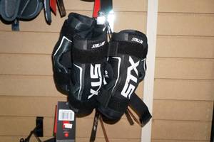 lot 146 image: 16 Sets STX Stallion 50 Youth Arm Pads