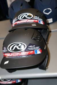 lot 299 image: 2 Rawlings Batting Helmets