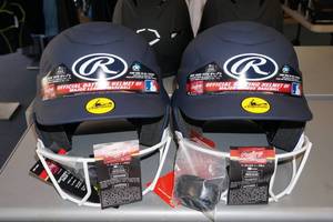 lot 301 image: 2 Rawlings Batting Helmets with Cages
