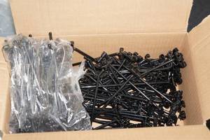 lot 539 image: Box of Black Grid Pegs