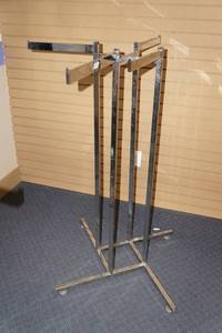 lot 577 image: (1) 4 Way Apparel Rack