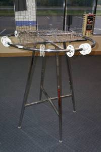 lot 581 image: Round Apparel Rack