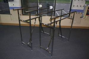 lot 582 image: (2) Parallel Bar Apparel Racks
