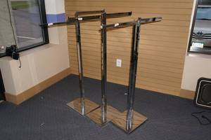 lot 583 image: (3) 2 Way Apparel Rack