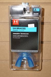 lot 320 image: Under Armour Braces Strapped Mouthguards