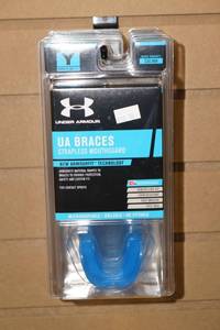 lot 321 image: Under Armour Braces Strapless Mouthguards