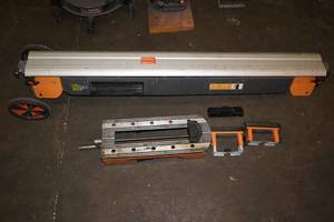 lot 26 image: Port-A-Mate Rolling Miter Saw Stand