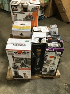 lot 11 image: Pallet with assorted Vacuums- Dyson, Shark, Ridgid, Hoover Customer returns